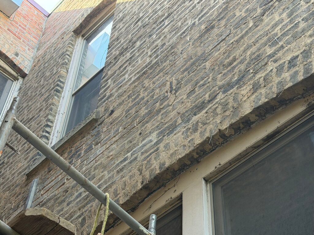 Historic Mortar & Stone Matching Historic brick facade under assessment for restoration